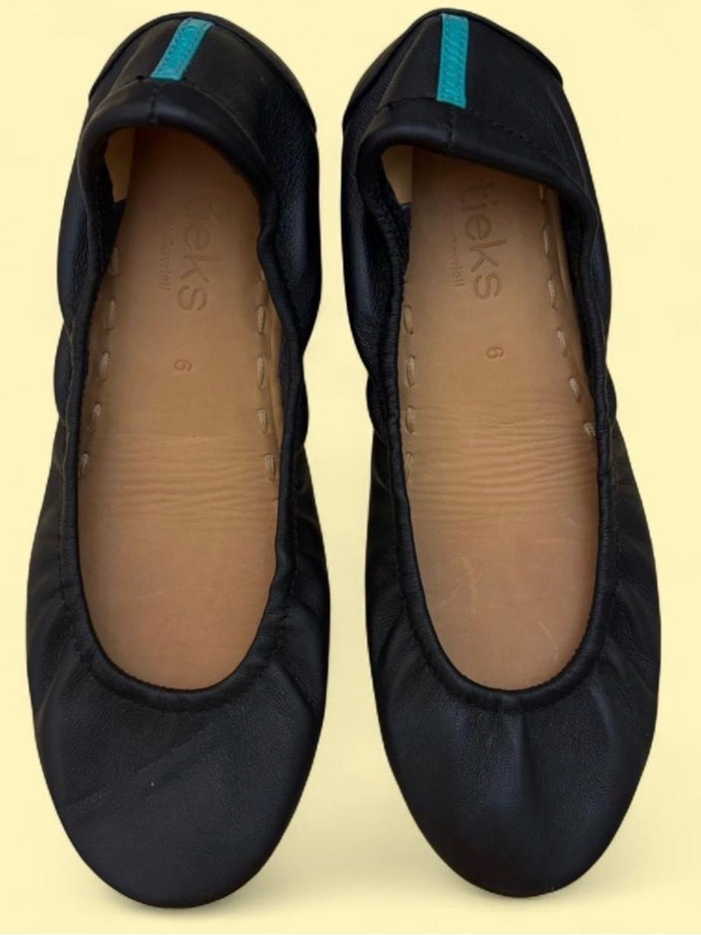 Tieks Black Leather Flats with Teal Heel Tab